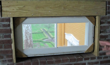 inside view of attic transom window replicated by Welch Millwork and Design