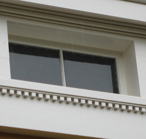 outside view of attic transom window replicated by Welch Millwork and Design