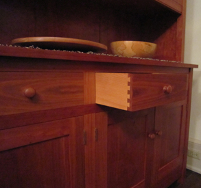 close-up on dovetailing in drawer of hutch built by Welch Millwork and Design