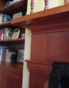 close-up on mantel ledge constructed by Welch Millwork and Design