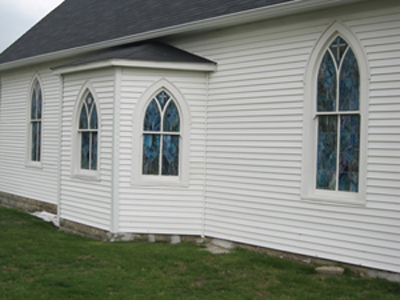 east-side view of Poplar Baptist's stained glass windows built by Welch Millwork and Design